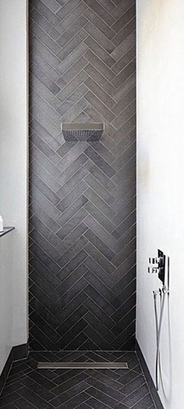 herringbone design on waterfall shower wall remodel of tub replacement and regrout clean tile steam near me tile installers near me tile boulder